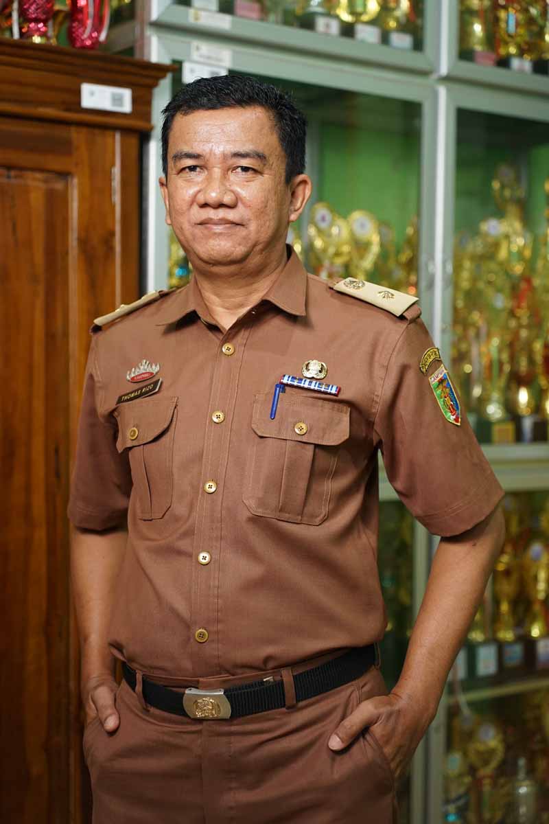 Thomas Rizo Junison, S.Pd
